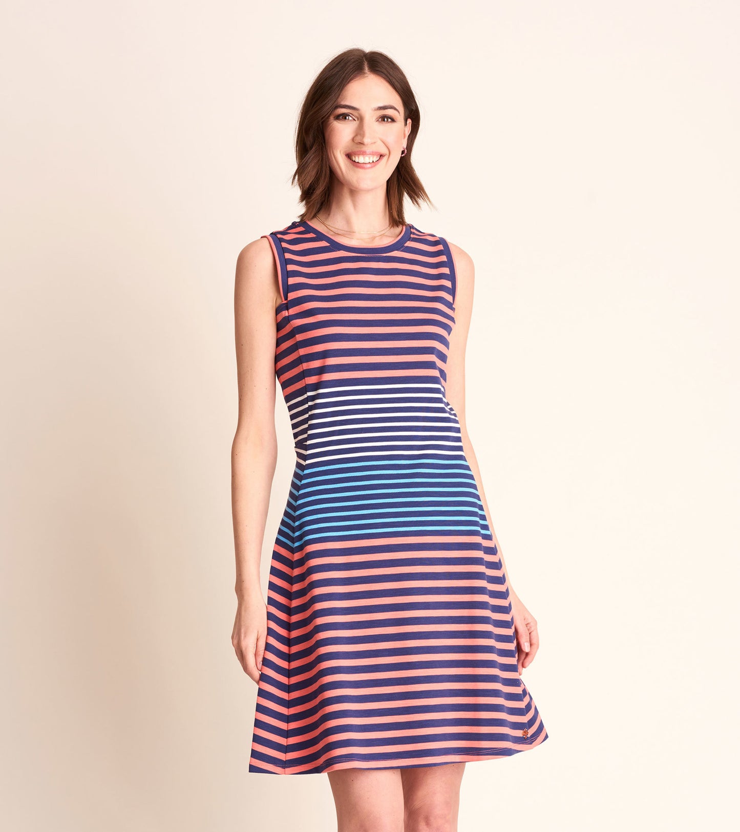 Sleeveless dress featuring navy and coral stripes, flared skirt, and a round neckline.