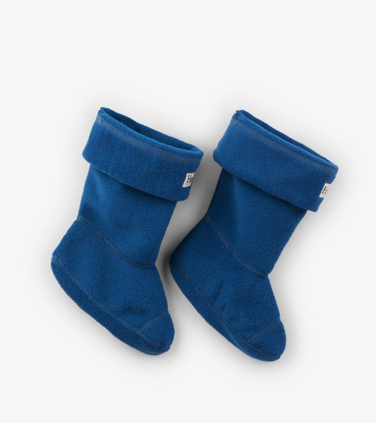 Navy blue fleece boot liners with a fold-over cuff, designed for kids' comfort and warmth.