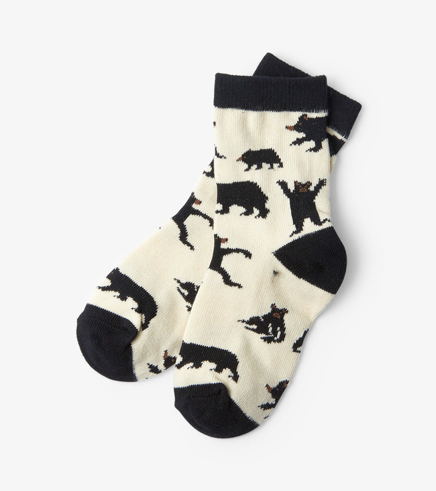 Cream crew socks featuring playful black bear patterns and a navy cuff, suitable for kids ages 2-7.