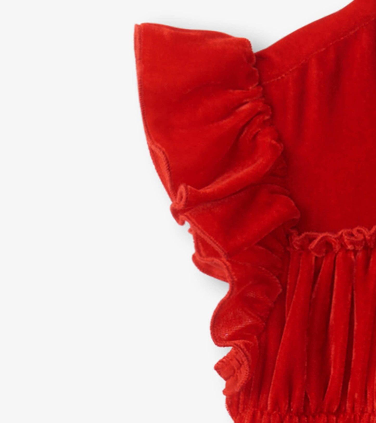Red velvet dress featuring smocked panel and ruffled sleeves, ideal for girls.