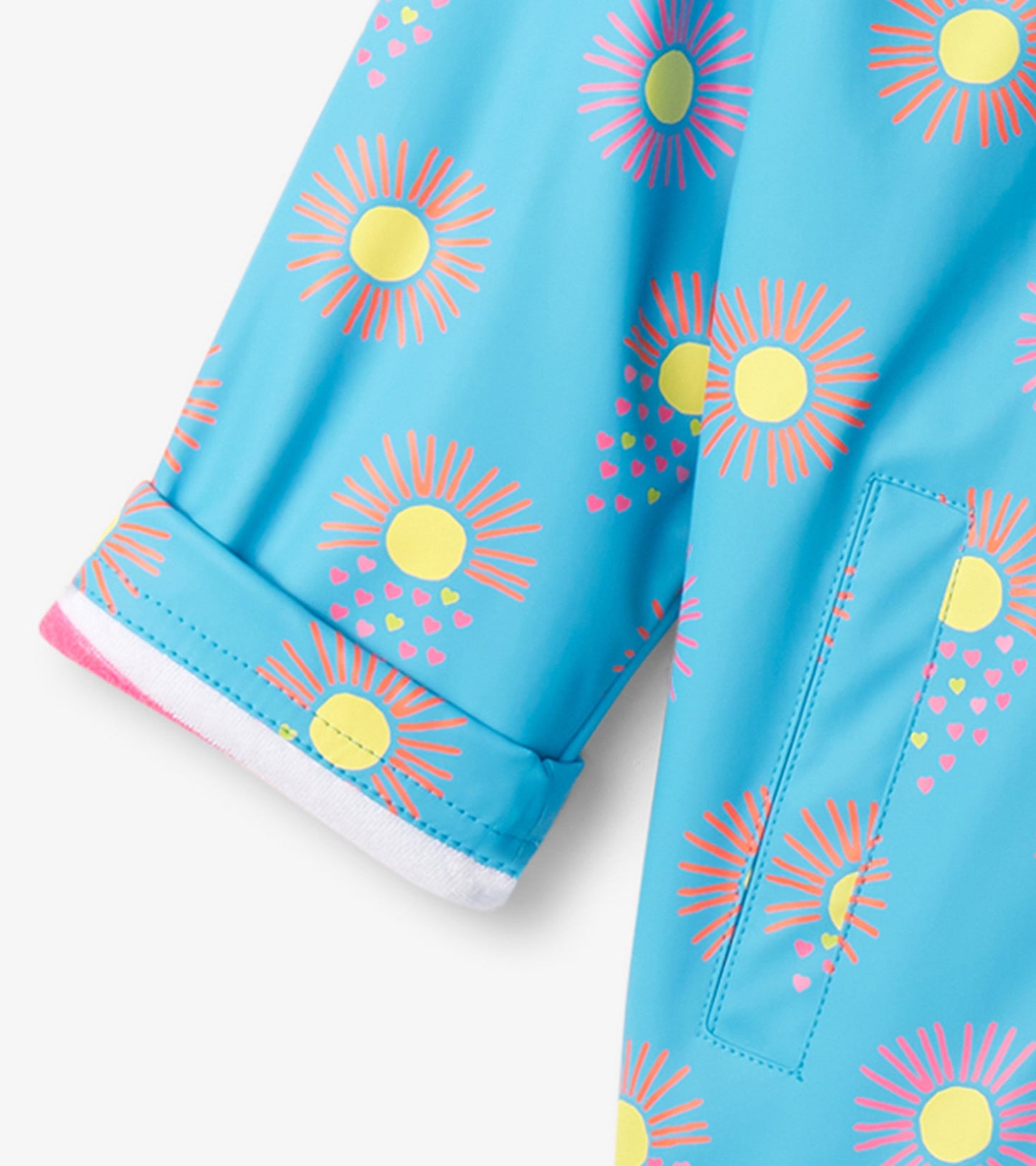 Light blue zip-up rain jacket featuring colorful sun and heart patterns, with a cuffed sleeve design.