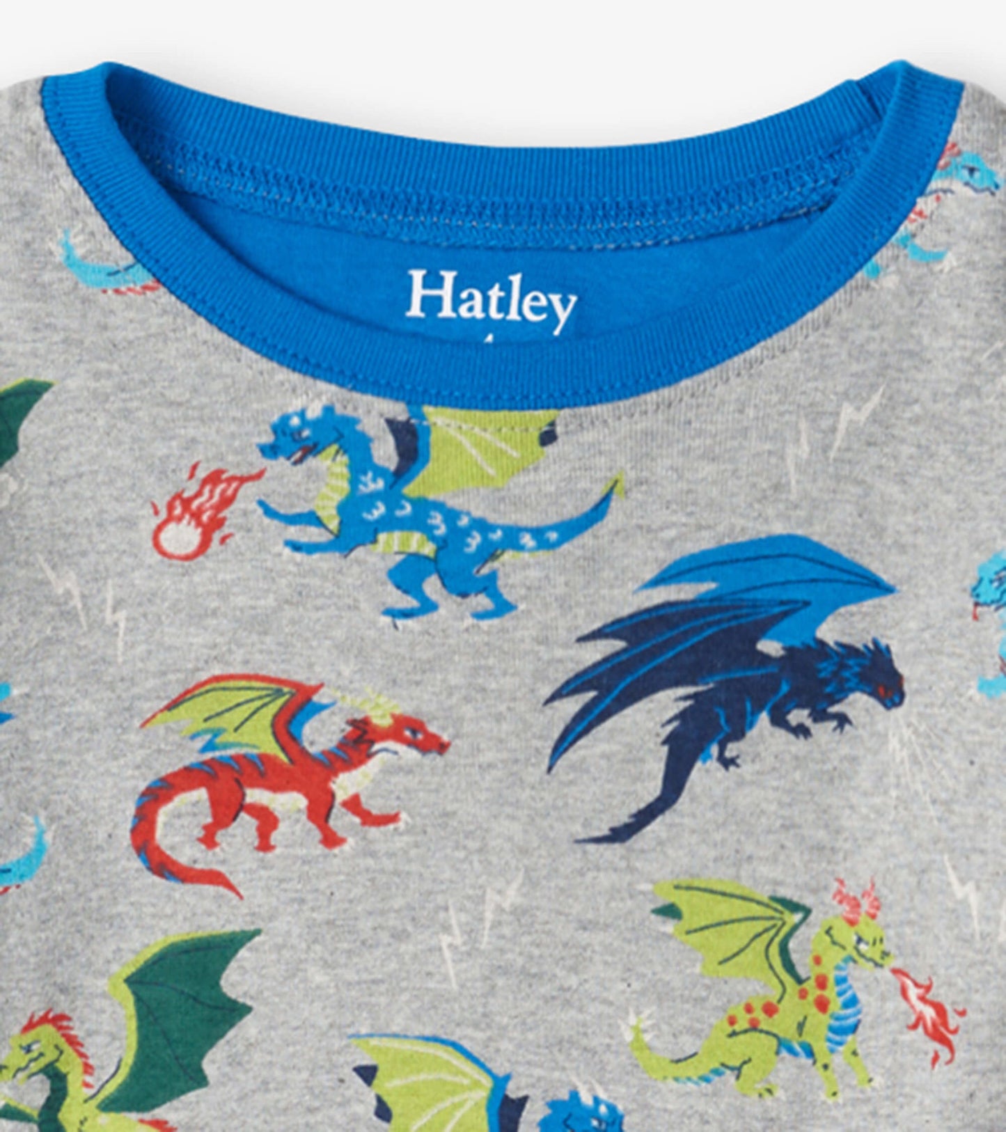 Gray organic cotton pajama top featuring colorful dragon prints and a blue crew neckline.