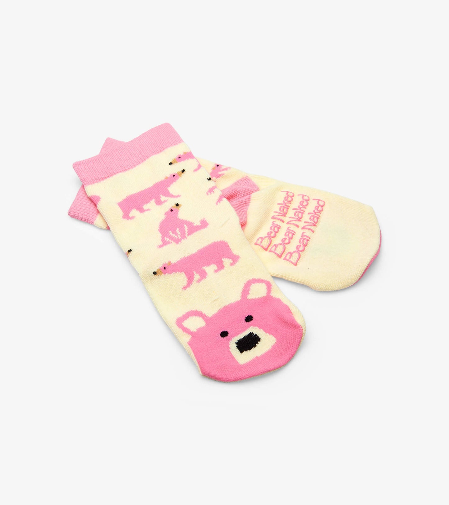 Pink and cream kids' socks featuring bear and animal patterns, ideal for ages 2-7.