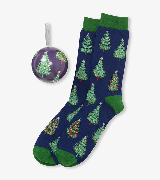 Navy Christmas tree socks with green cuffs, heels and toes, shown with matching ornament ball packaging