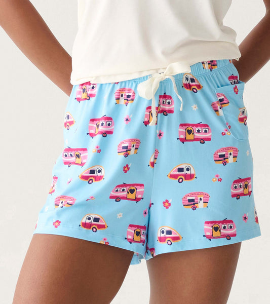 Light blue pajama shorts with pink camper print, elastic waist, white drawstring, and side pocket, front view