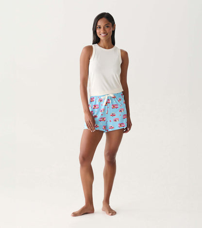 Women’s light blue pajama shorts with colorful camper print and white drawstring, front view