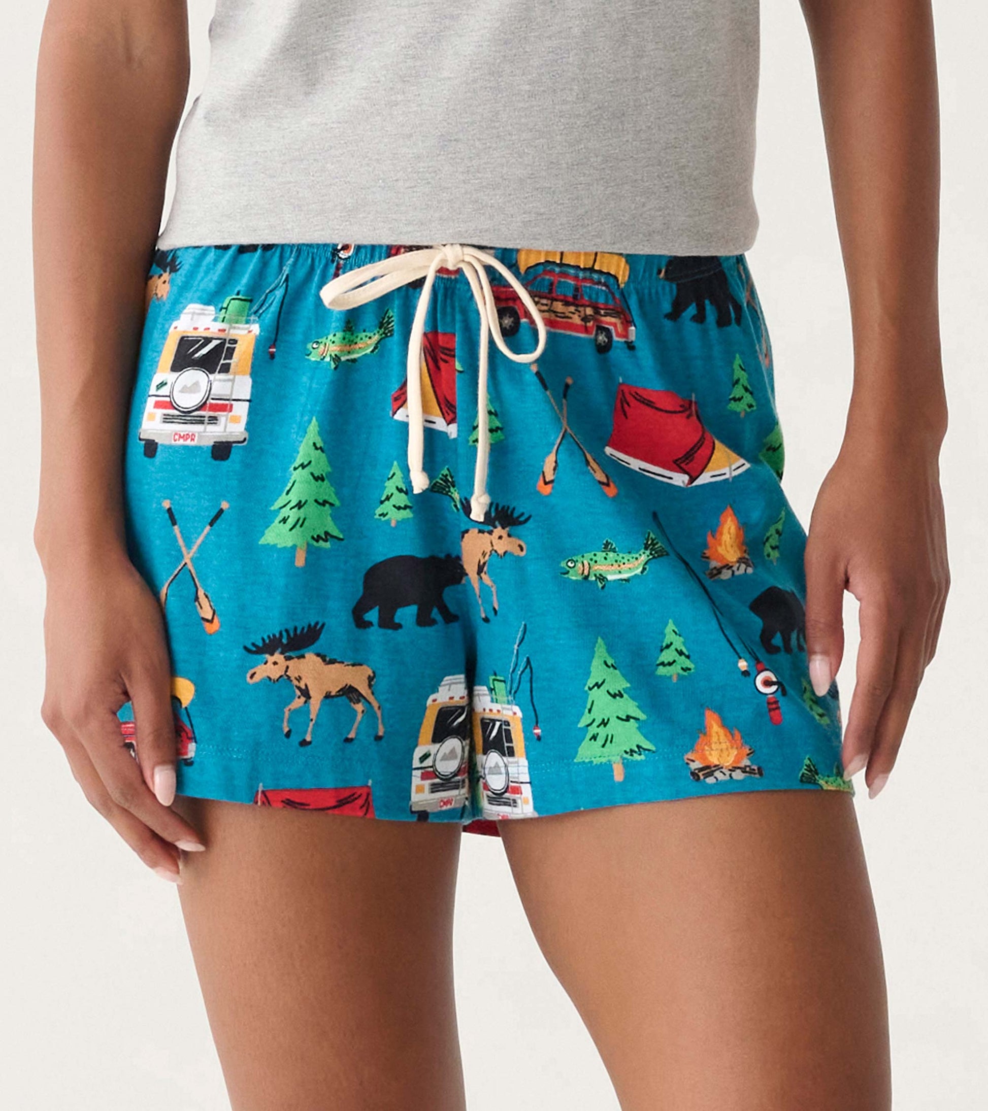 Blue camping-print pajama shorts with drawstring waist, shown on model front view