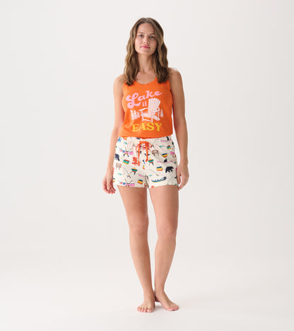 Cotton sleep shorts with a colorful lake-themed print and an elastic waistband featuring an orange drawstring.
