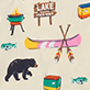 View On The Lake Women's Cotton Sleep Shorts - Black bear, pink dragonfly, yellow and pink canoe paddle, orange and teal tackle box, fish, and stickers with “Lake Hous