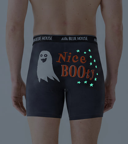 Back view of slate blue boxer briefs with glowing stars around the Nice BOOty ghost graphic
