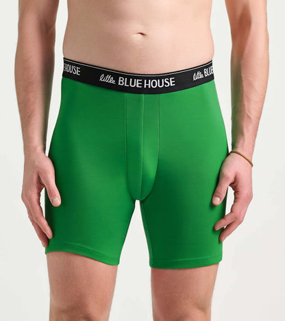 Green men's boxer briefs with a black logo waistband, front view