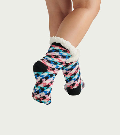 Colorful houndstooth pattern women's socks with a soft sherpa lining, designed for comfort and warmth.