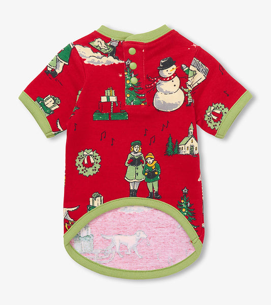 Back of red dog pajama with green trim, snap placket, and vintage Christmas print with snowmen and carolers