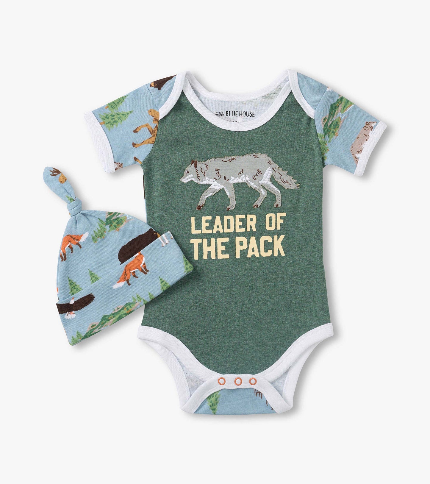 Green baby bodysuit with wolf graphic and “Leader of the Pack” text, plus matching fox-print hat