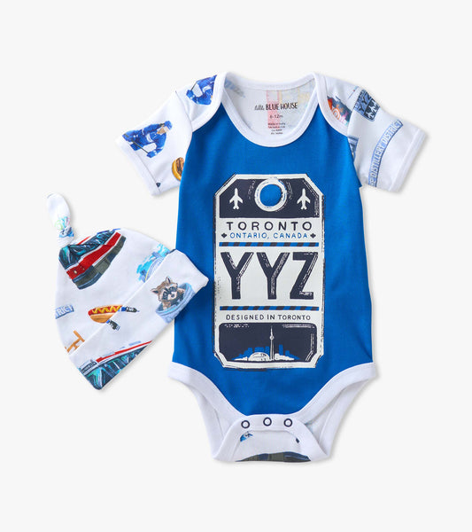 Blue baby bodysuit with white trim, Toronto YYZ tag graphic, and matching city-print knot hat