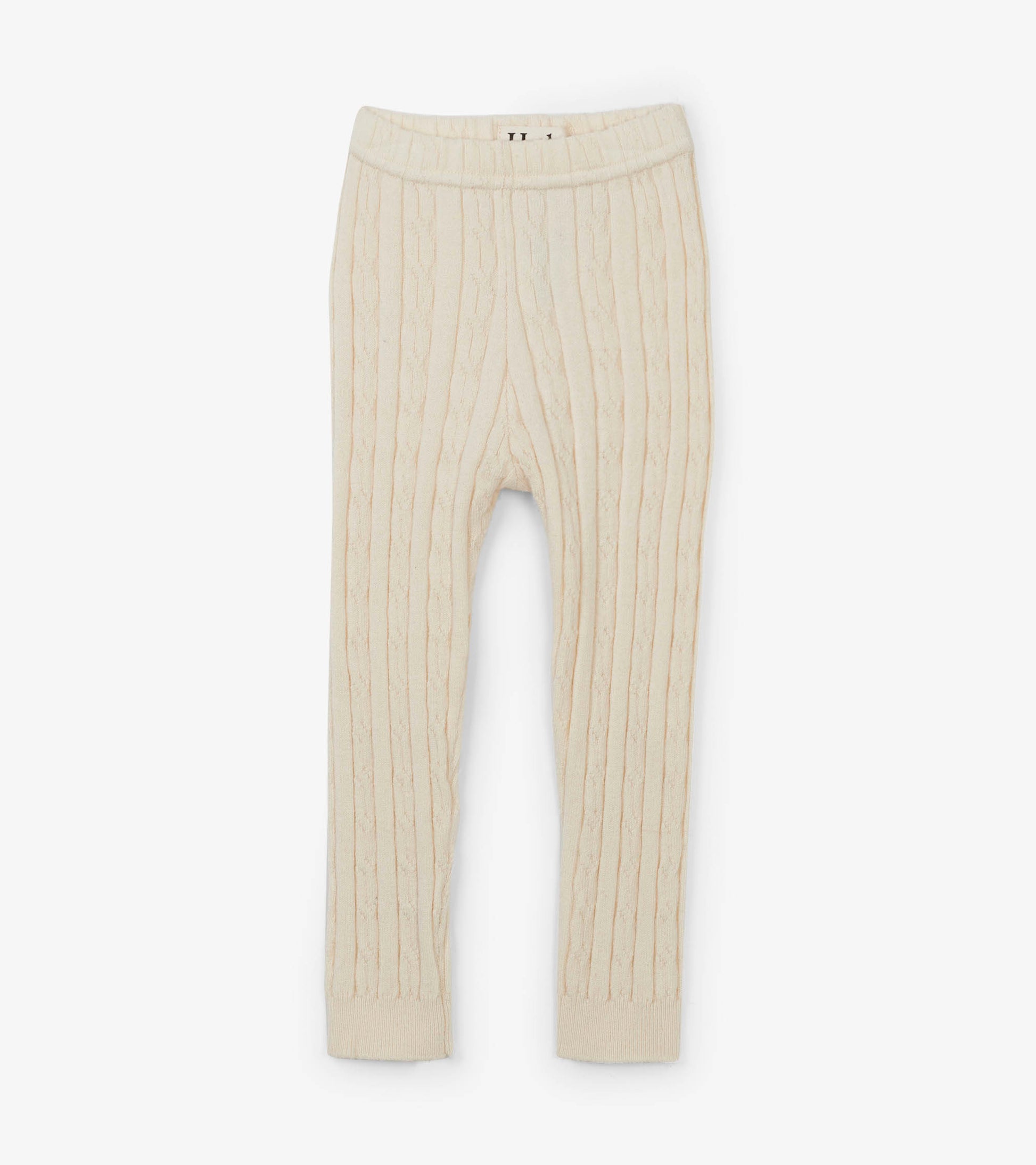 Cream cable knit tights with ribbed texture, designed for infants, featuring an elastic waistband for comfort.