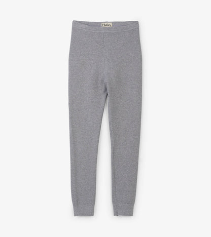 Gray cable knit leggings with a shimmer finish, featuring a stretchy waistband and fitted ankle cuffs.
