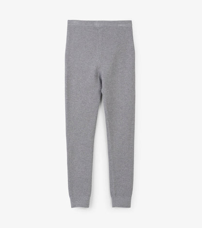 Gray cable knit leggings with a shimmer finish, featuring a fitted design and elastic waistband.