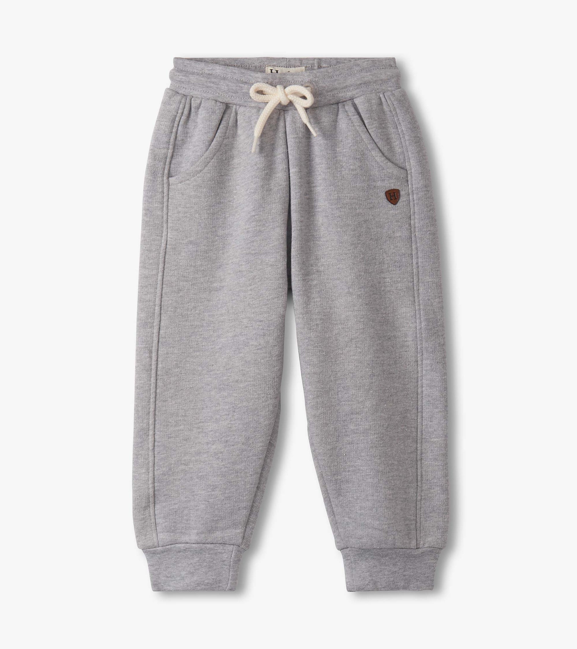 Grey athletic track pants for baby and toddler boys, featuring a drawstring waist and side pockets.