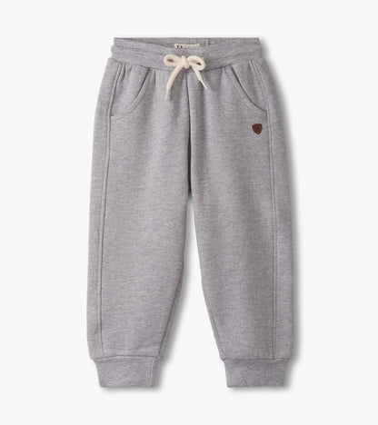 Grey athletic track pants for baby and toddler boys, featuring a drawstring waist and side pockets.