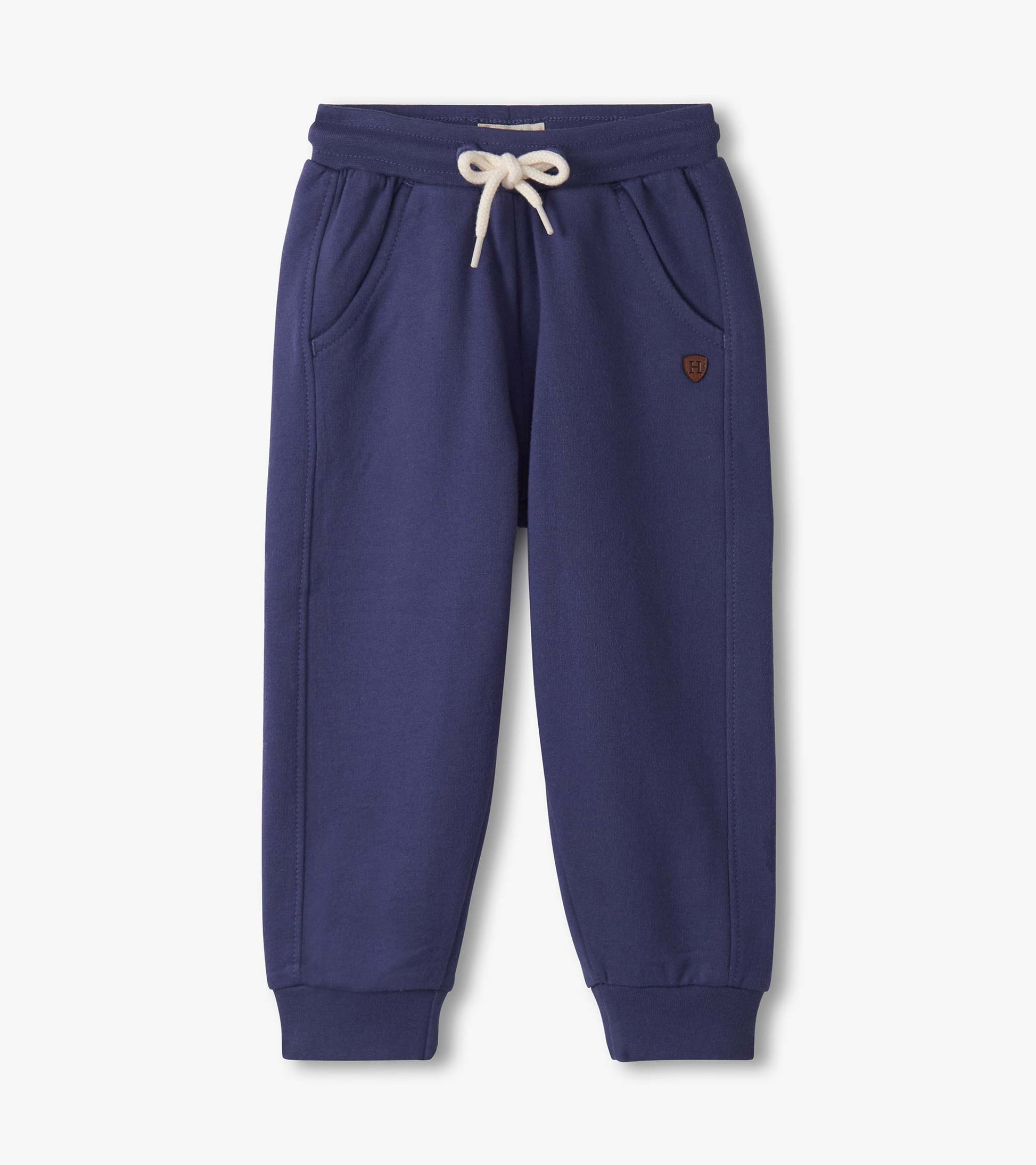 Patriot blue track pants for baby and toddler boys, featuring an elastic waistband and side pockets.
