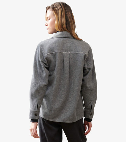 Back view of charcoal melange relaxed blazer with center back pleat and button cuffs