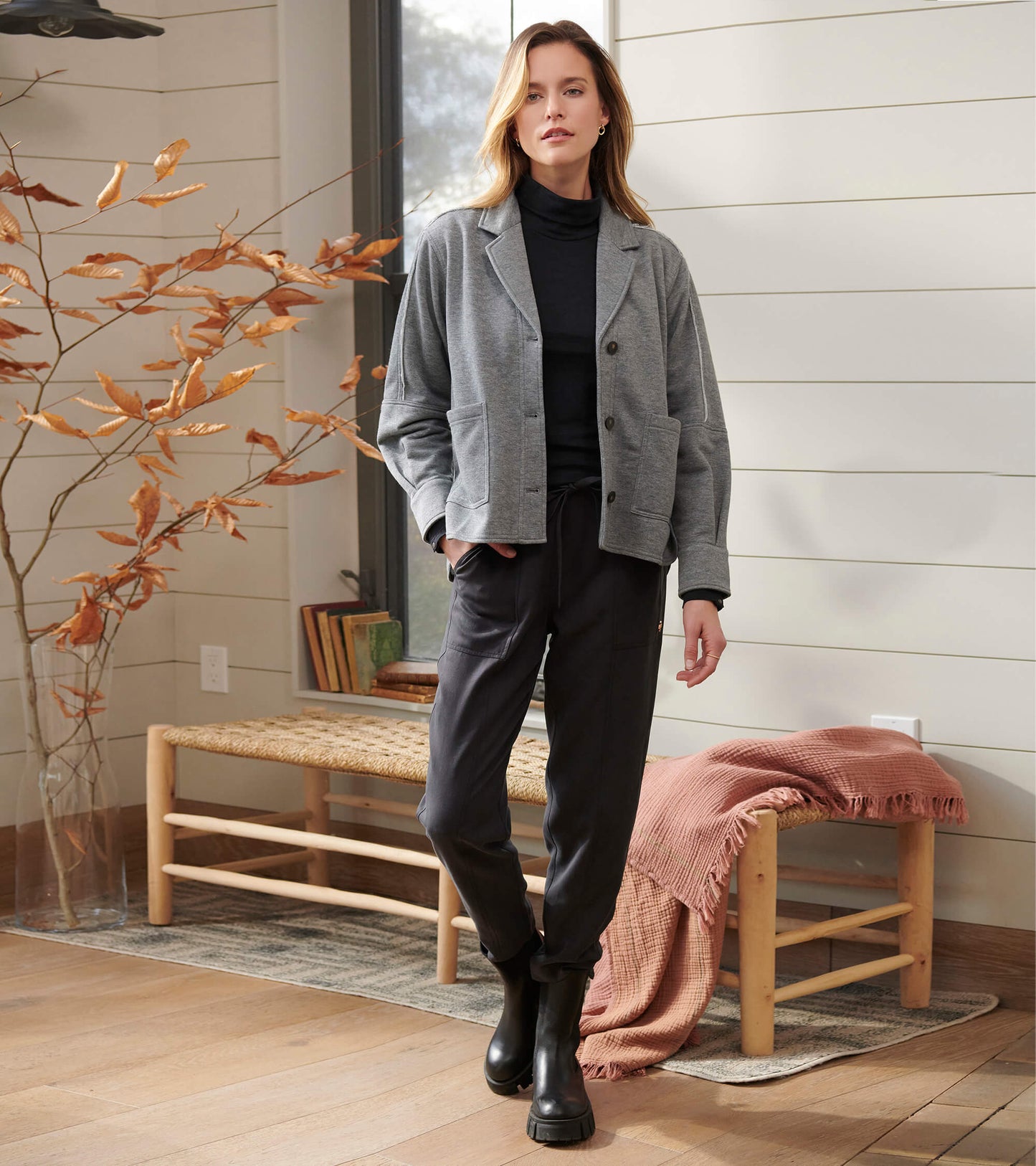 Charcoal melange relaxed blazer styled with black turtleneck, dark pants and black ankle boots