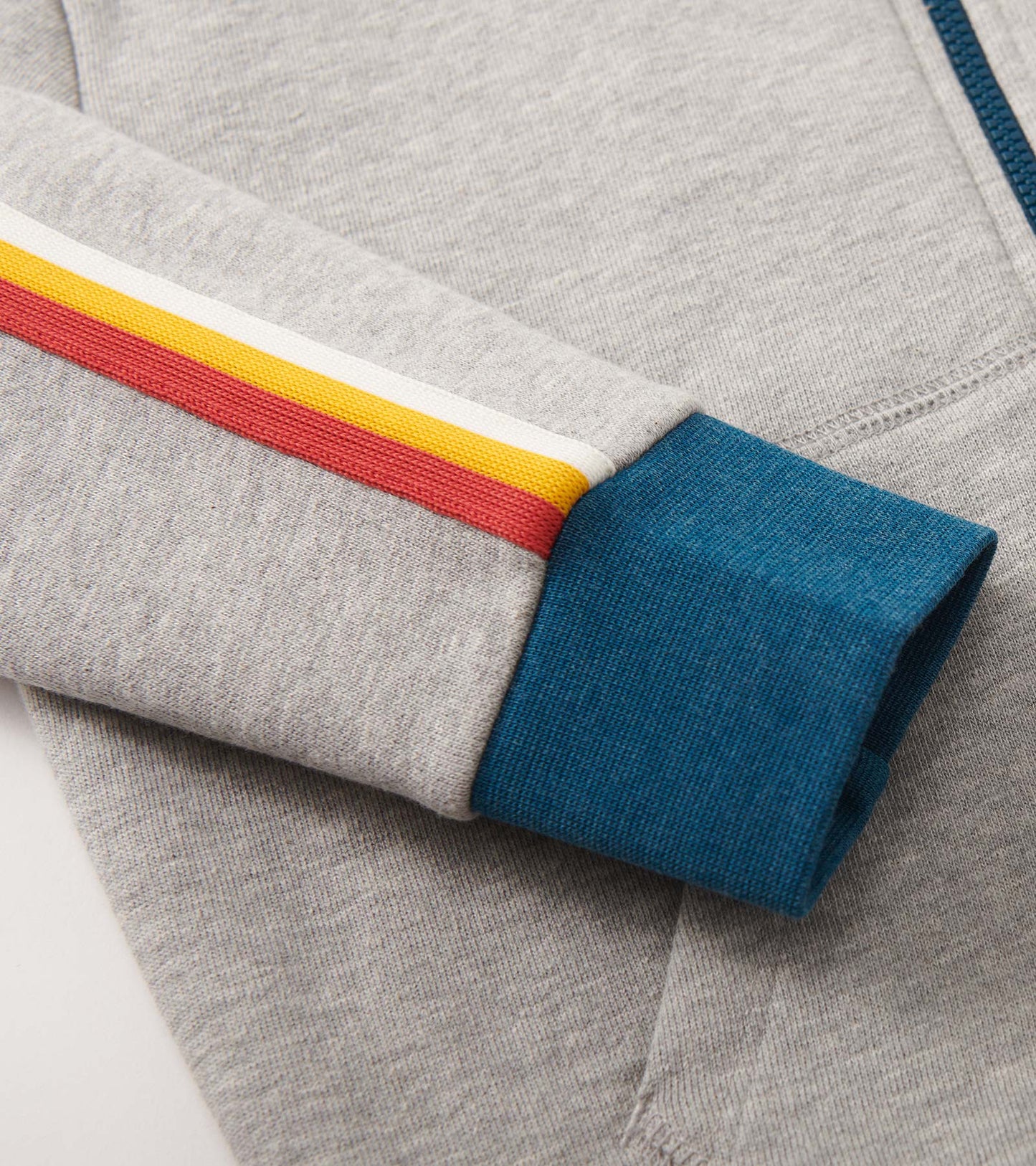 Grey zip-up hoodie featuring colorful striped accents on the sleeves and a teal cuff. Ideal for athletic wear.