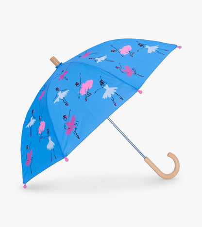 Blue umbrella featuring ballet dancer prints in pink and white, with a curved handle and pink tips.