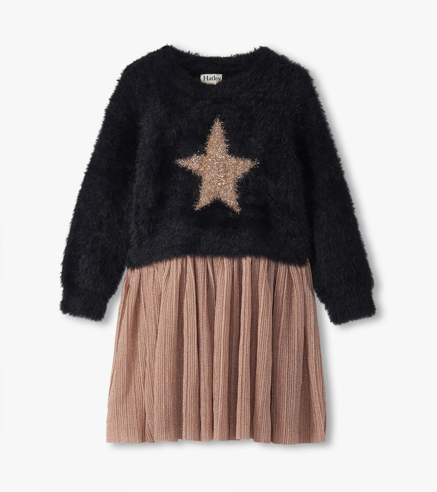 Black fuzzy top with a gold star design, paired with a pleated, shimmery rose gold skirt. Long sleeves, casual style.