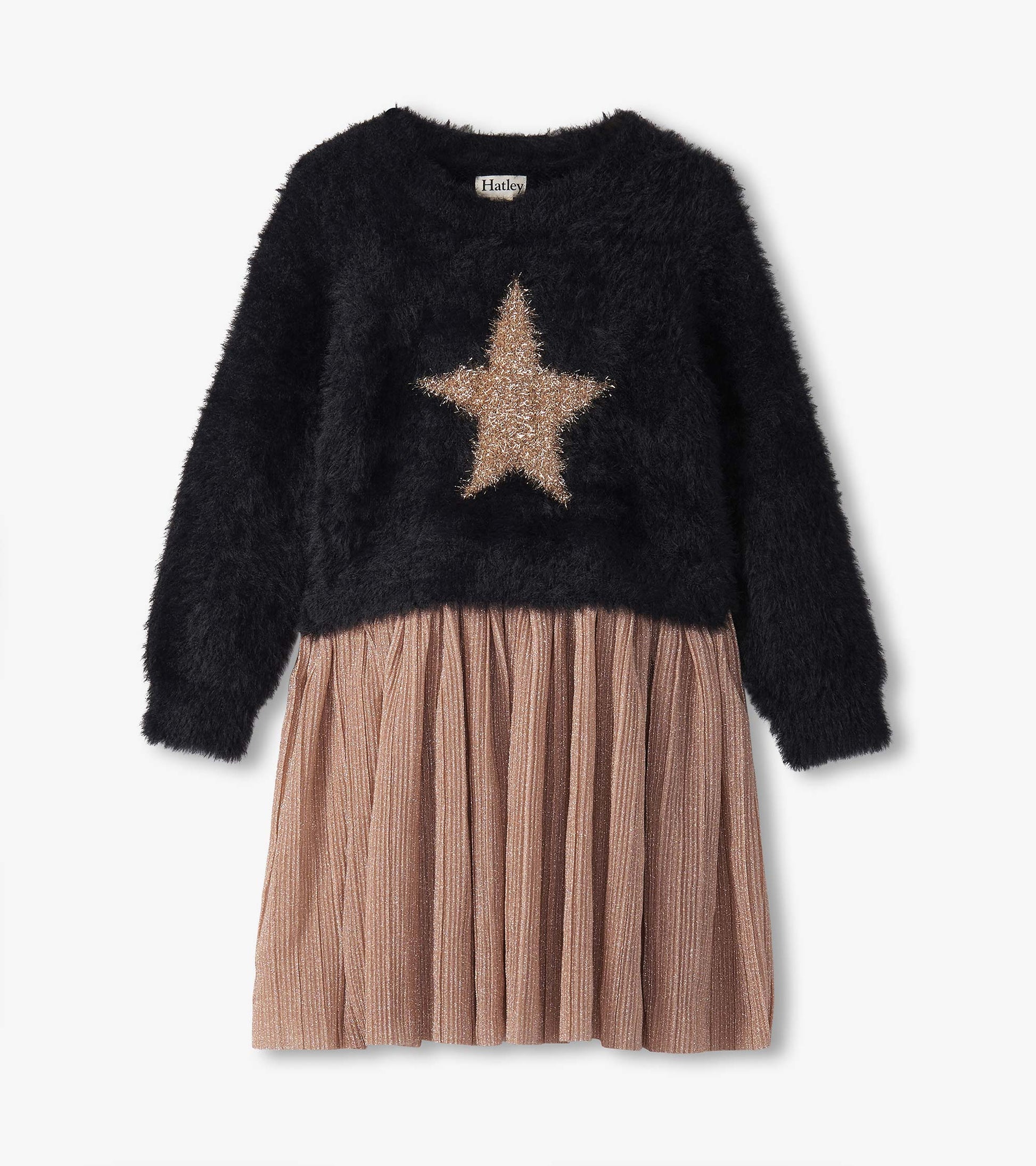 Black fuzzy top with a gold star design, paired with a pleated, shimmery rose gold skirt. Long sleeves, casual style.