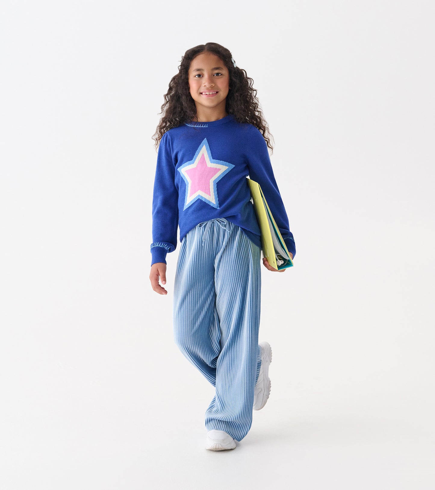 Cornflower blue pleated velour relaxed pants with an elastic waistband, styled for casual wear.