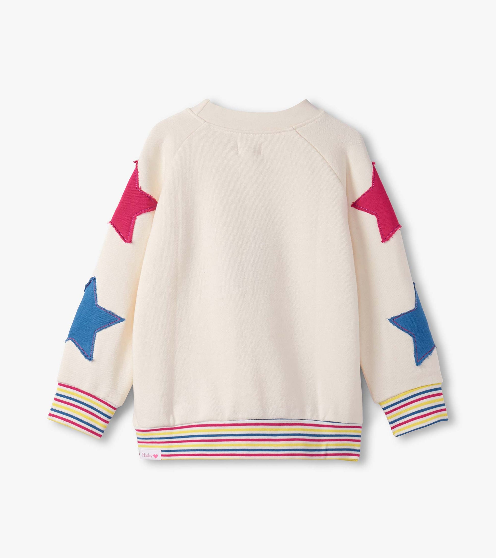 Cream pullover with colorful star appliqués on sleeves and striped ribbed hem. Suitable for casual wear.