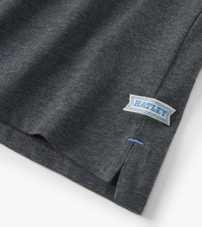 Blue and grey colour block long sleeve polo shirt with a side slit and a label on the hem.