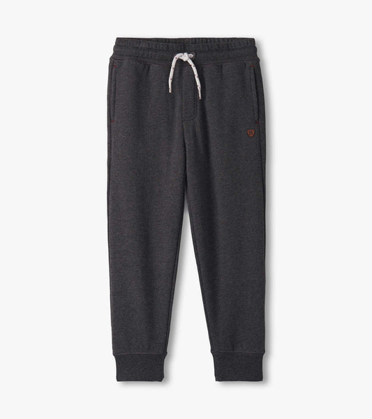 Charcoal melange joggers with an elastic waistband, drawstring, and side pockets, designed for boys.