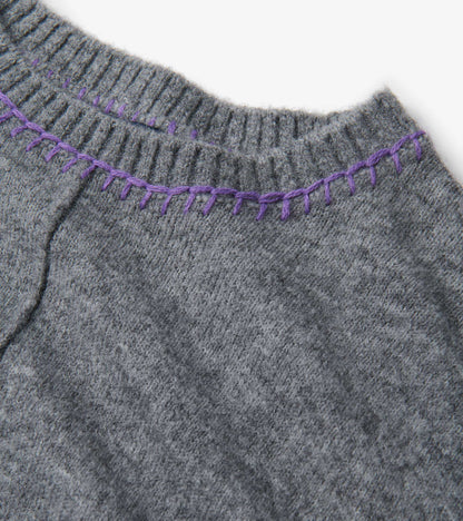 Charcoal melange sweater featuring a ribbed neckline with contrasting purple stitching.