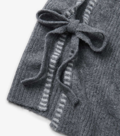 Charcoal melange side-tie sweater vest with a textured knit and a bow detail at the waist.
