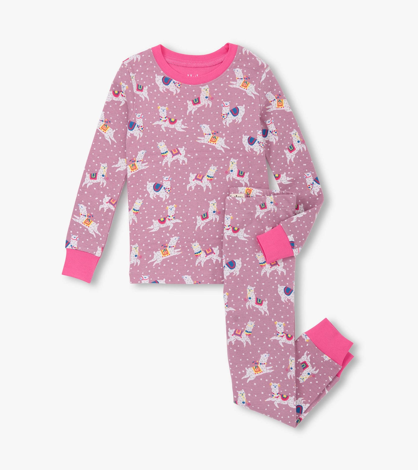 Pink cotton pajama set featuring playful dancing alpacas and polka dots, with contrasting pink cuffs and neckline.