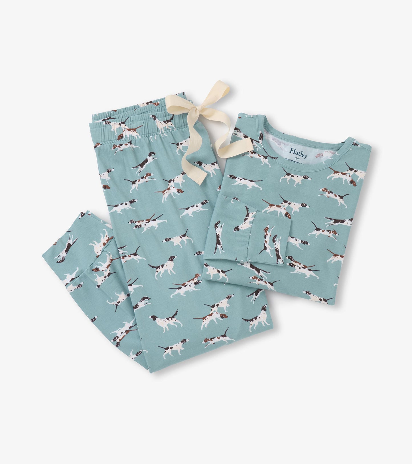 Bamboo pajama set featuring a playful dog print on a teal background, includes a short-sleeve top and matching pants.