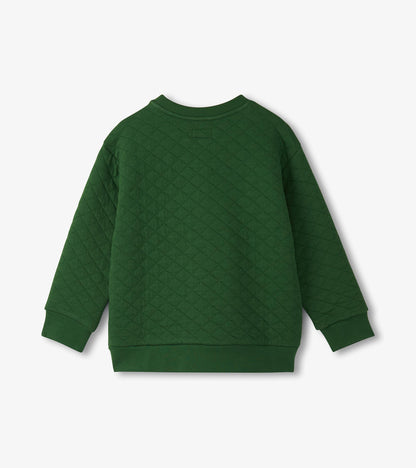Green quilted pullover with long sleeves and ribbed cuffs, featuring a textured diamond pattern.