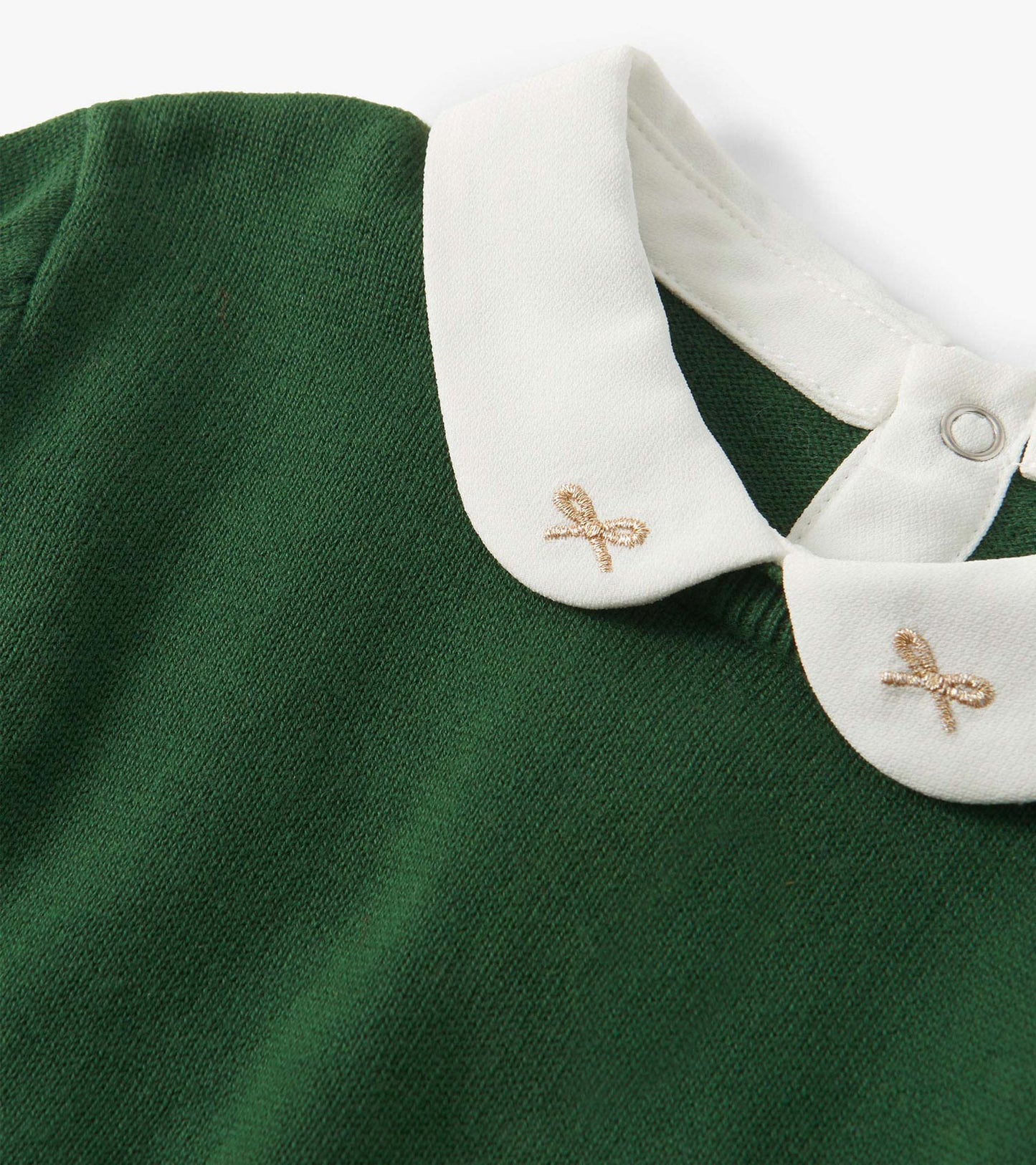 Green sweater featuring a white collar with gold bow embroidery, suitable for girls.