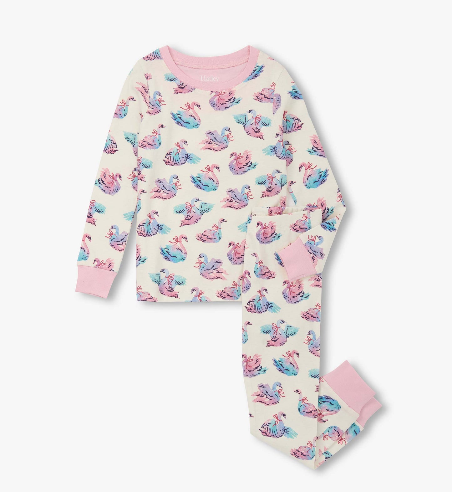 Cotton pajama set featuring a swan print in pastel colors, with long sleeves and matching pants, accented with pink cuffs.