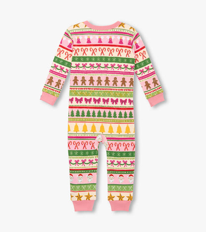 Pink cotton sleeper featuring a fun Fair Isle pattern with gingerbread, bows, and festive motifs. Long sleeves and footed de…