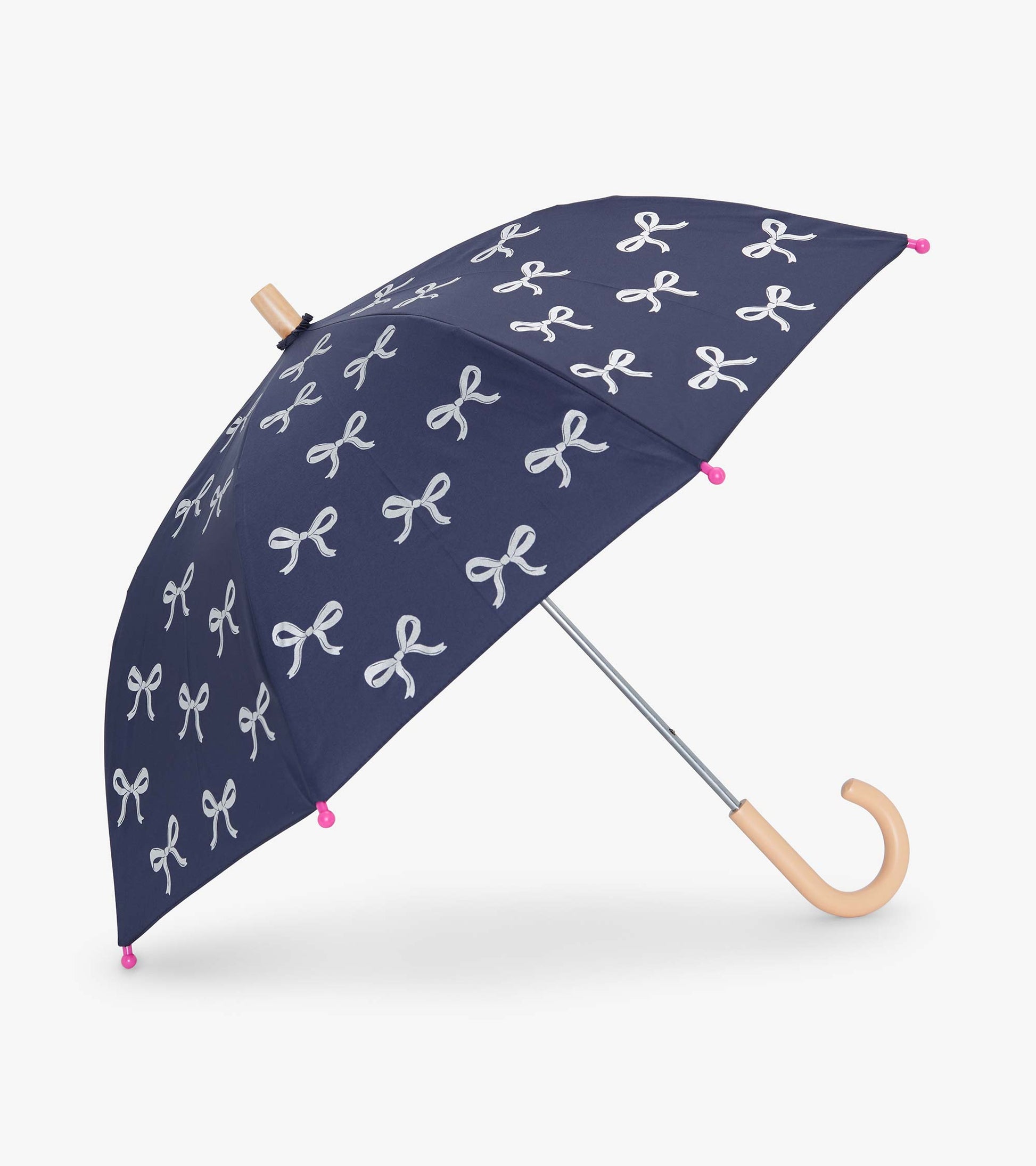 Navy umbrella with silver ribbon pattern and pink tips, featuring a curved handle and metal frame.
