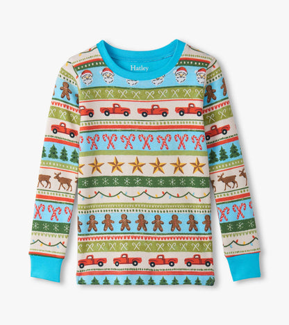 Boys' blue cotton pajama set featuring a festive Fair Isle pattern with trucks, trees, and holiday motifs.