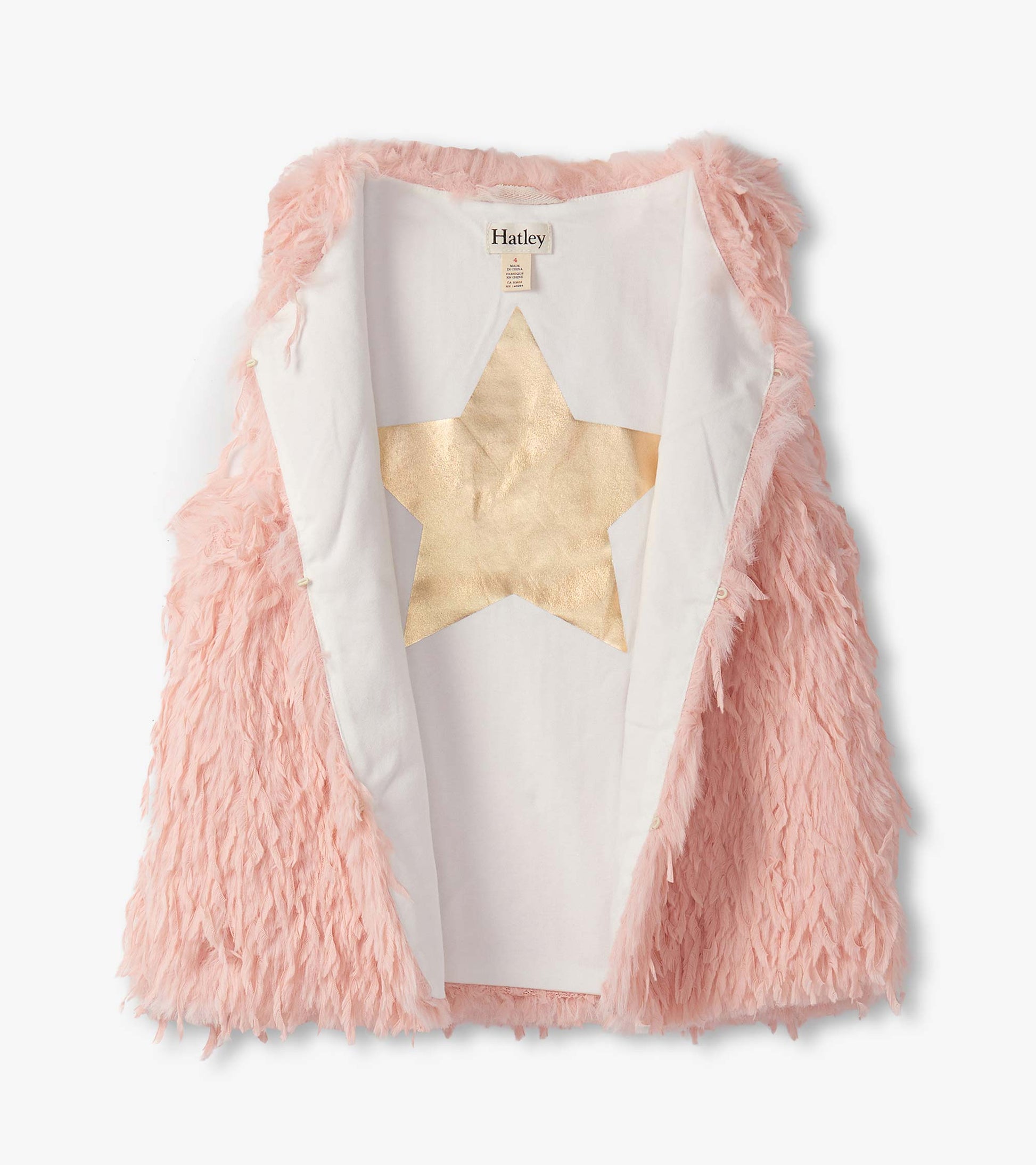 Pale pink faux fur vest with a soft texture and a gold star detail on the inner lining.