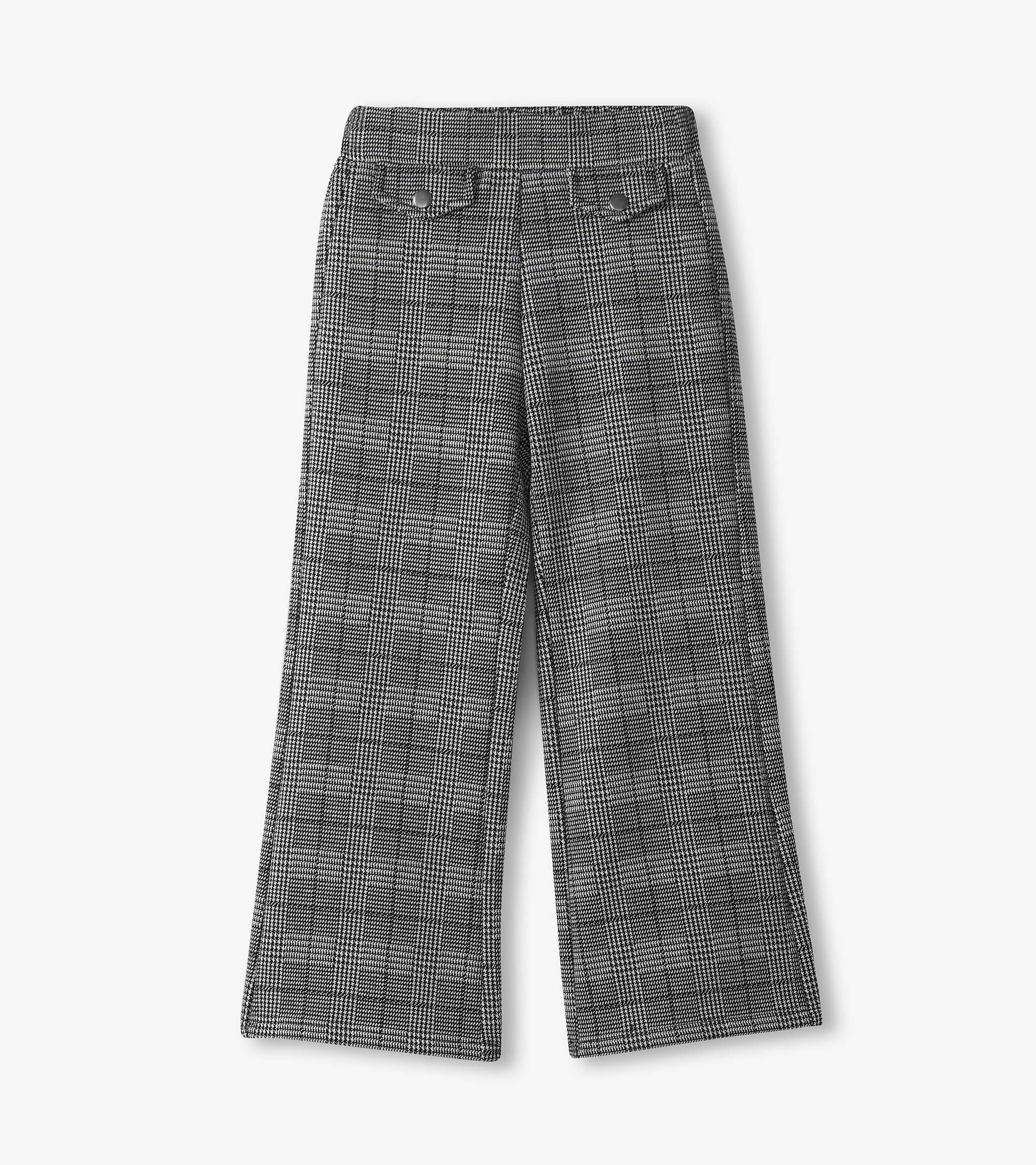 Wide leg pants in a black and white houndstooth pattern with a smooth waistband and back pockets.