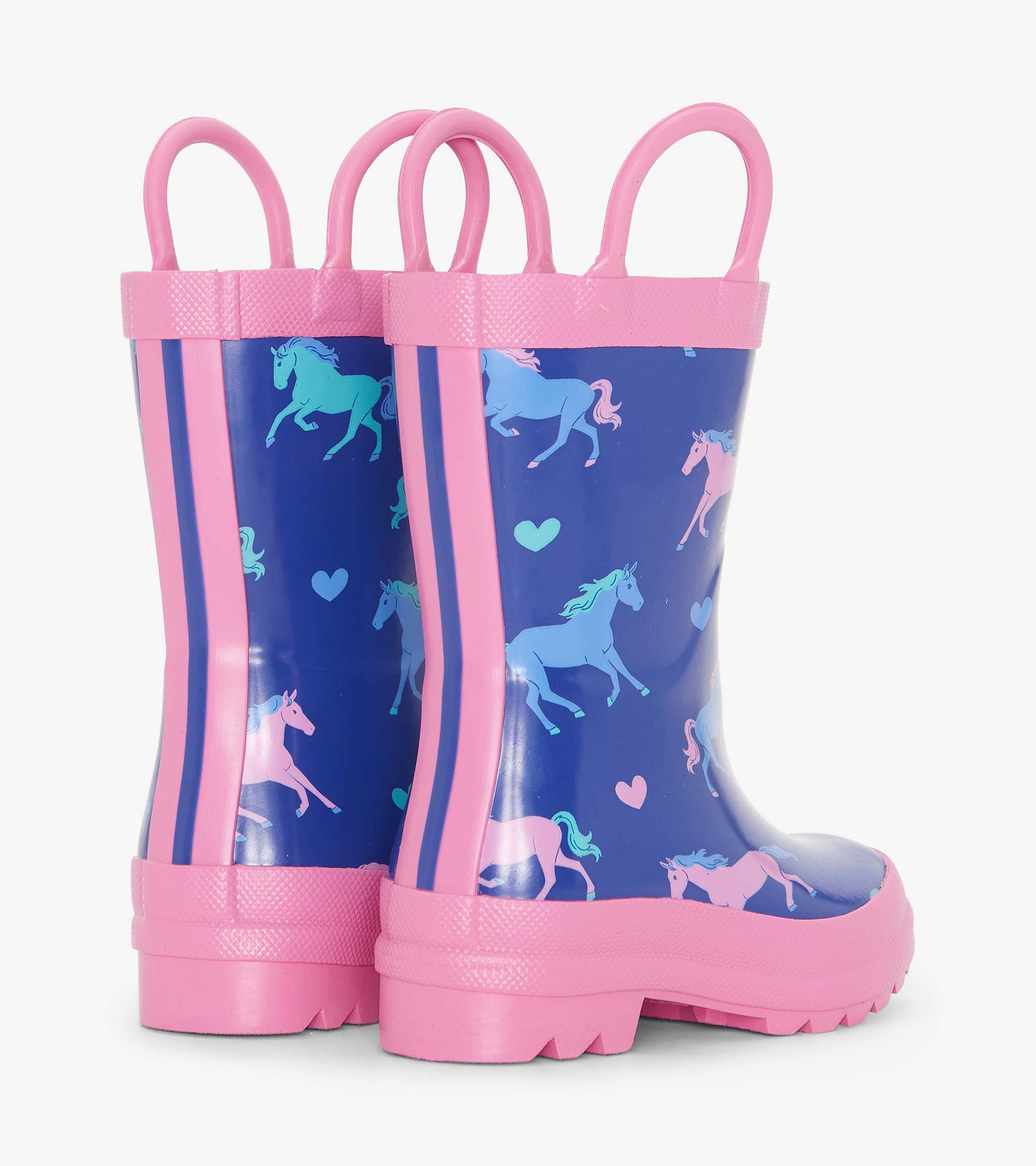 Blue rain boots with pink accents, featuring a unicorn and heart pattern, designed for toddlers.