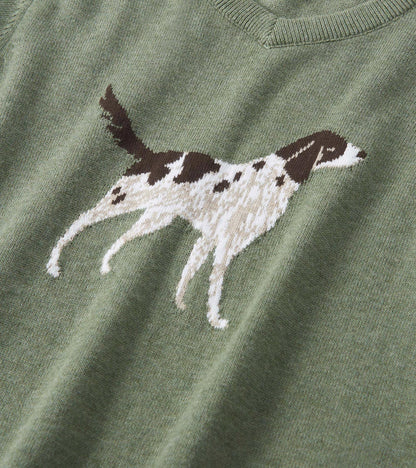 Green V-neck sweater featuring a knitted hunting dog design in brown and white. Soft material suitable for casual wear.