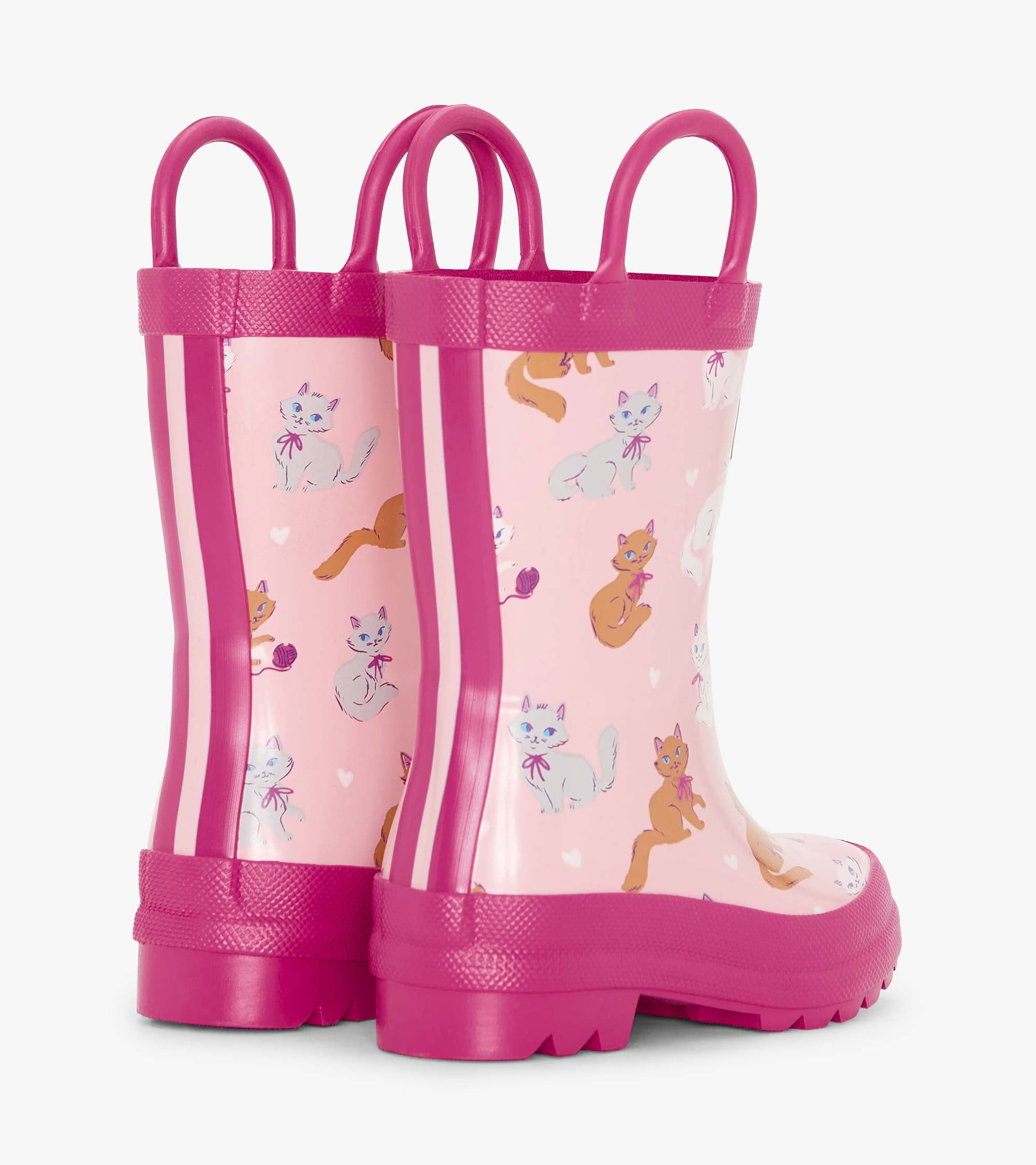Pink rain boots featuring a playful kitty pattern, with two handles and a textured sole for grip.